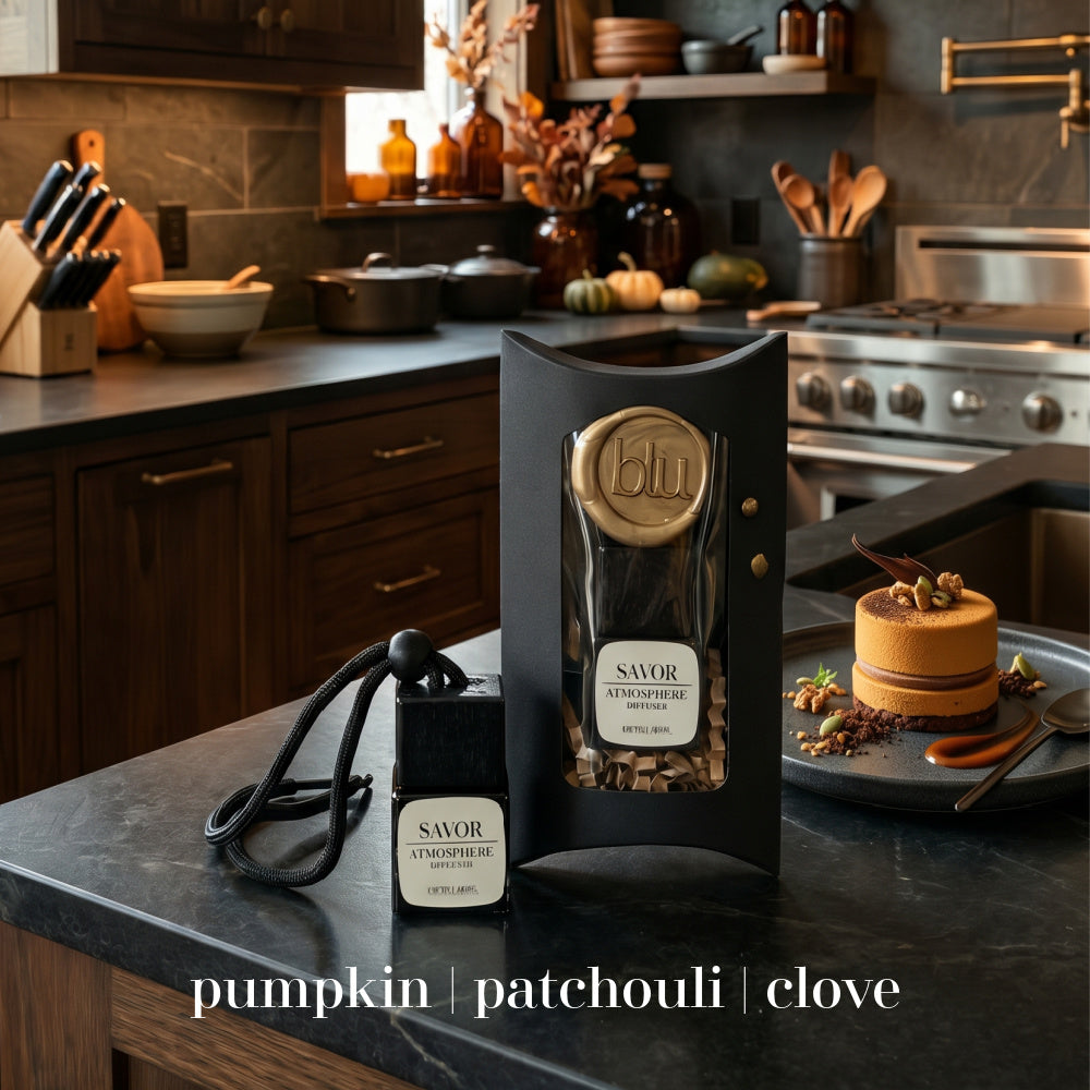 SAVOR pumpkin spice car diffuser in luxury packaging on kitchen counter with autumn dessert
