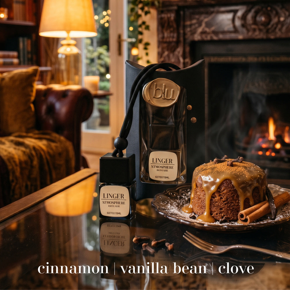 LINGER cinnamon vanilla car diffuser in luxury packaging on glass table with spiced dessert and fireplace
