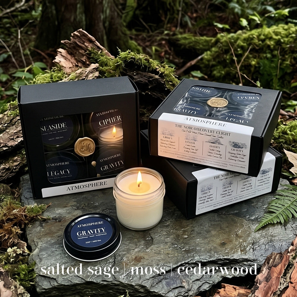 Gravity candle from The Noir Discovery Set styled with natural moss and cedarwood