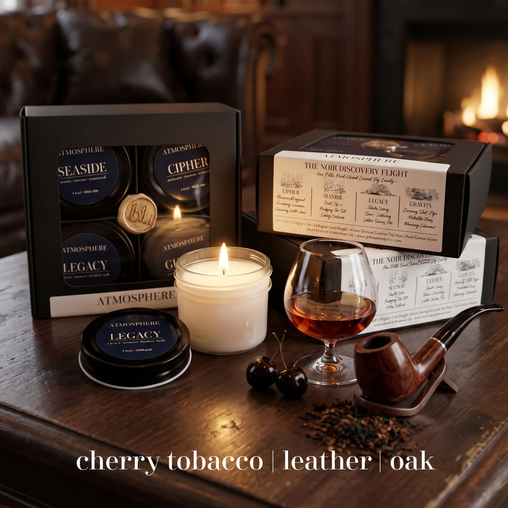 Legacy candle from The Noir Discovery Set styled with pipe tobacco and whiskey glass